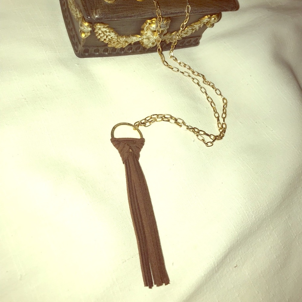 This is a leather Tassel necklace with gold chain,